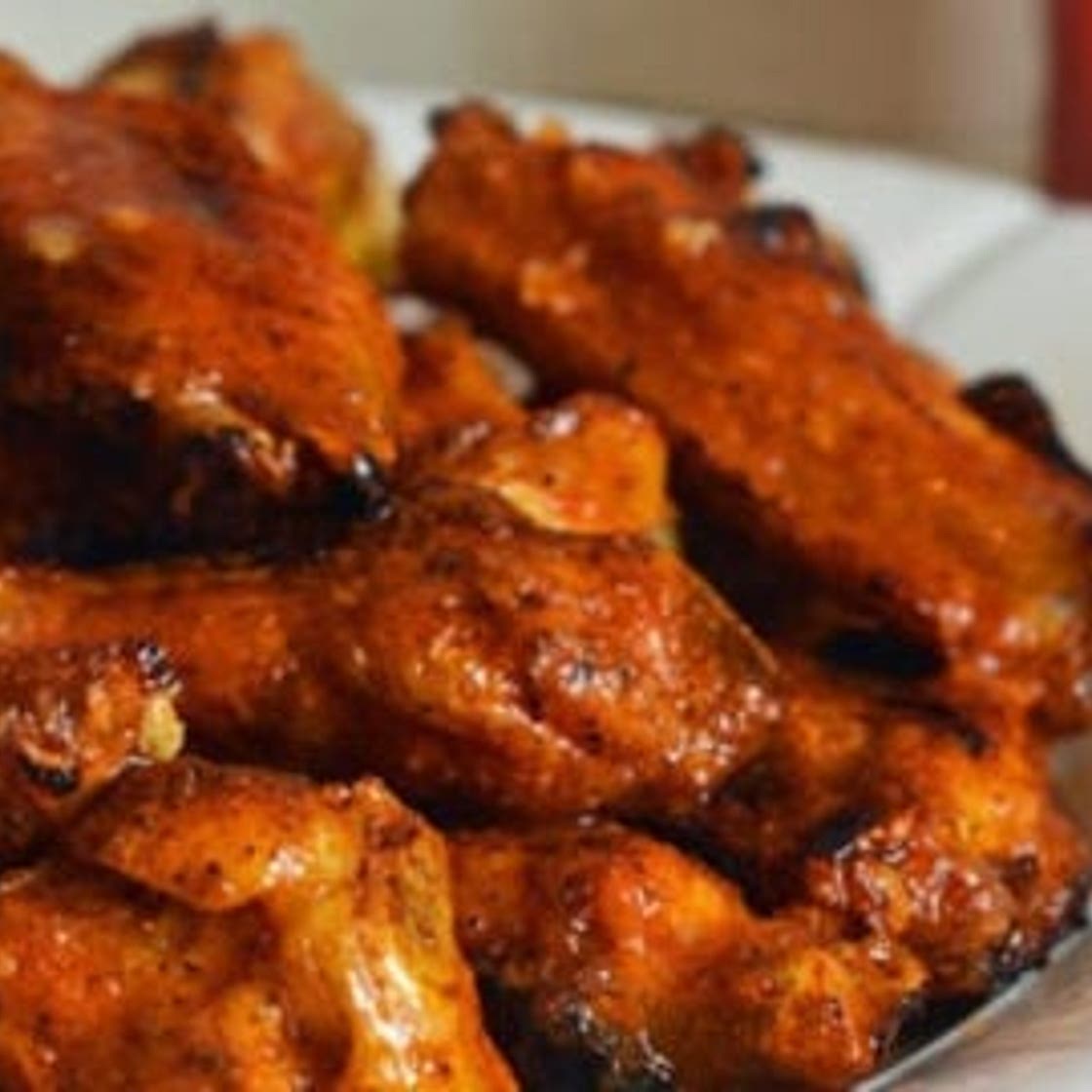 Grilled Chicken Wings with Seasoned Buffalo Sauce