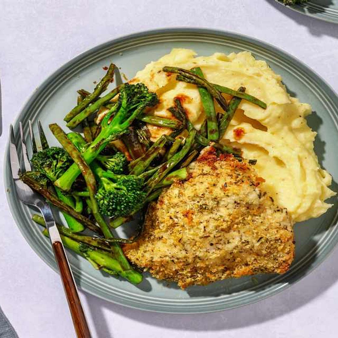 Herby Breaded Chicken Breast with Cheesy Mash, Garlicky Tenderstem® and Green Beans