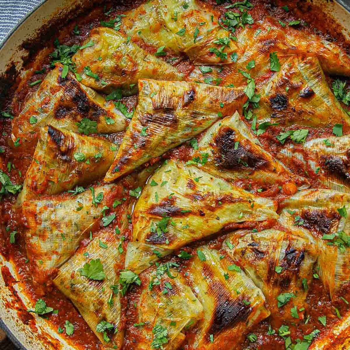 Chickpea & Rice Stuffed Leeks in Aromatic Spiced Tomato Sauce