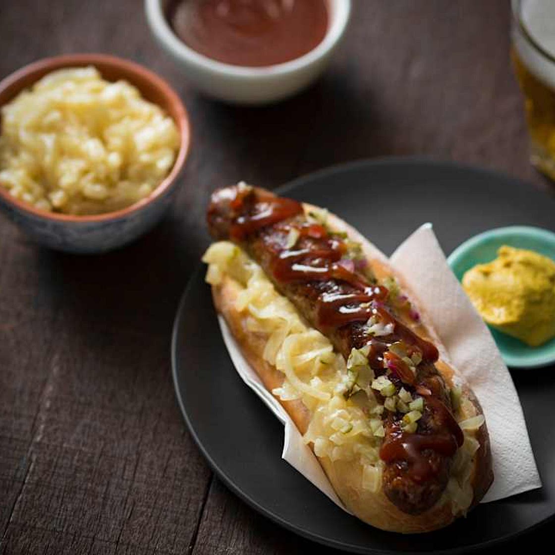 Sausage sizzle with beer braised onions