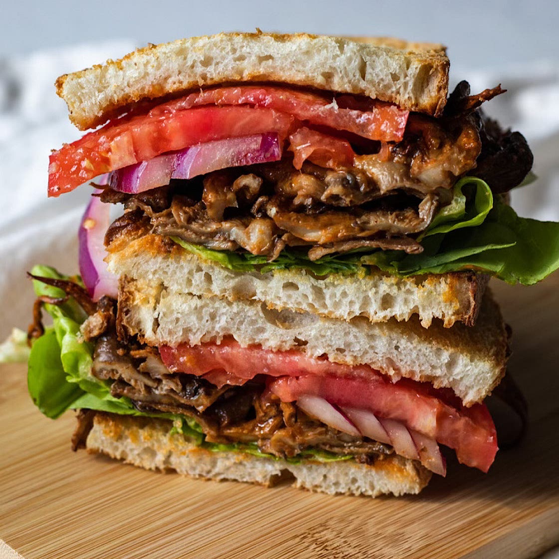 vegan buffalo chicken sandwich with oyster mushrooms