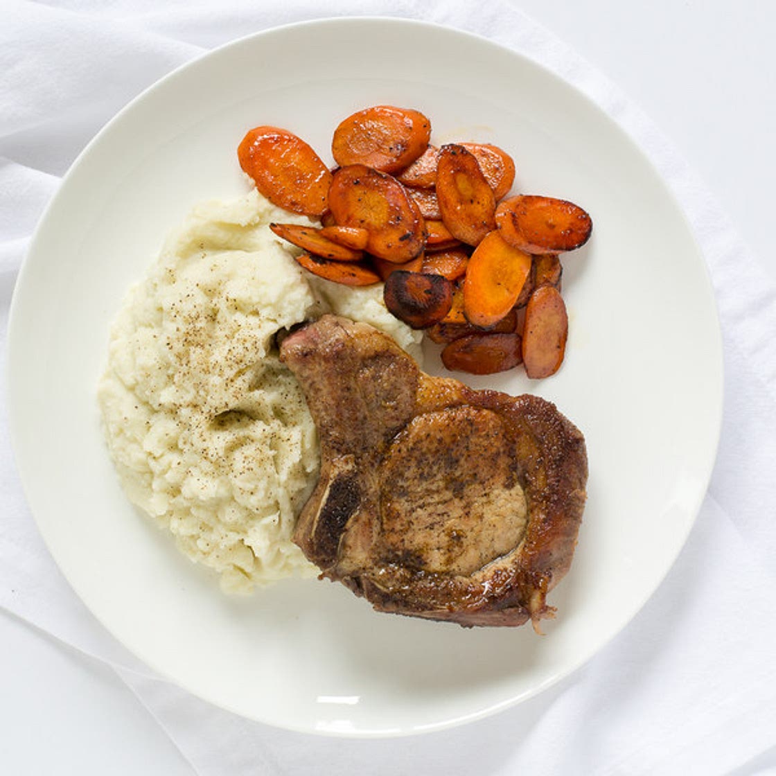 Pan-Fried Pork Chops with Sautéed Carrots & Cauliflower Mash