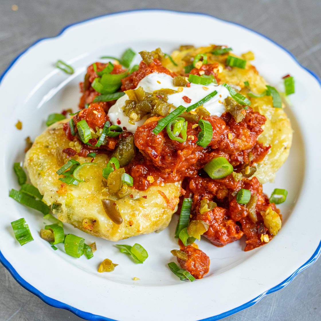 Smoky Sausage Ragù with Cheesy Spuds