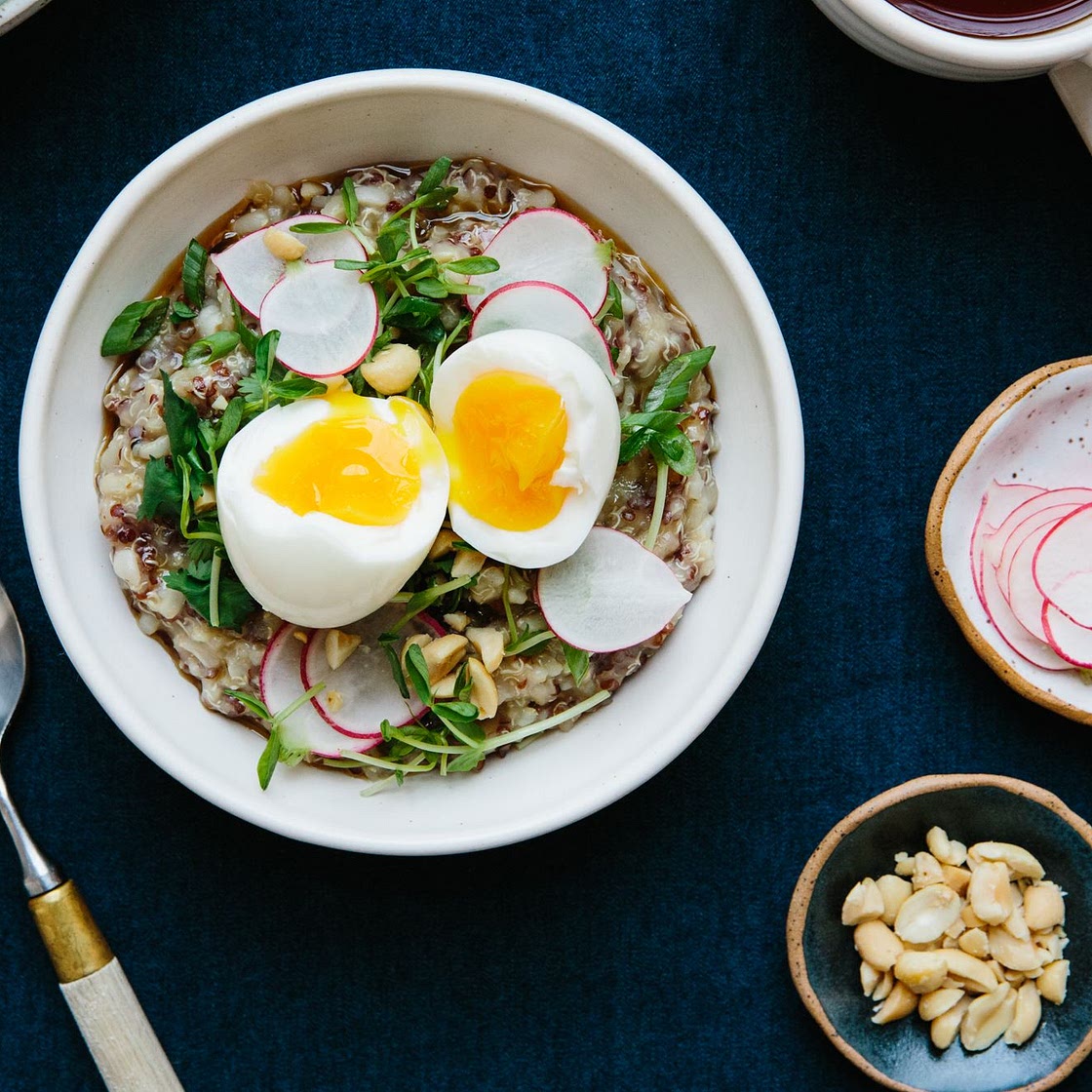 Breakfast Porridge with Soft Egg and Pea Shoots