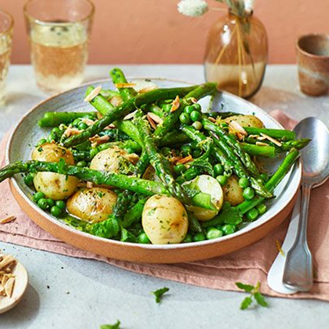 Asparagus with peas, mint & Jersey Royals in wild garlic butter