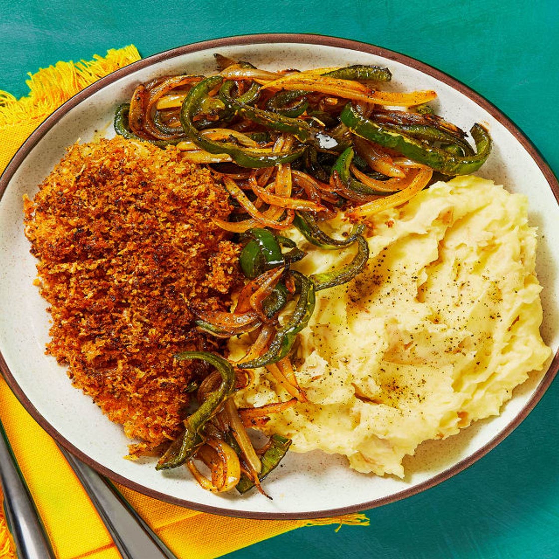 Crispy Southwestern Chicken Cutlets with Monterey Jack, Mashed Potatoes, and Roasted Poblano and Onion