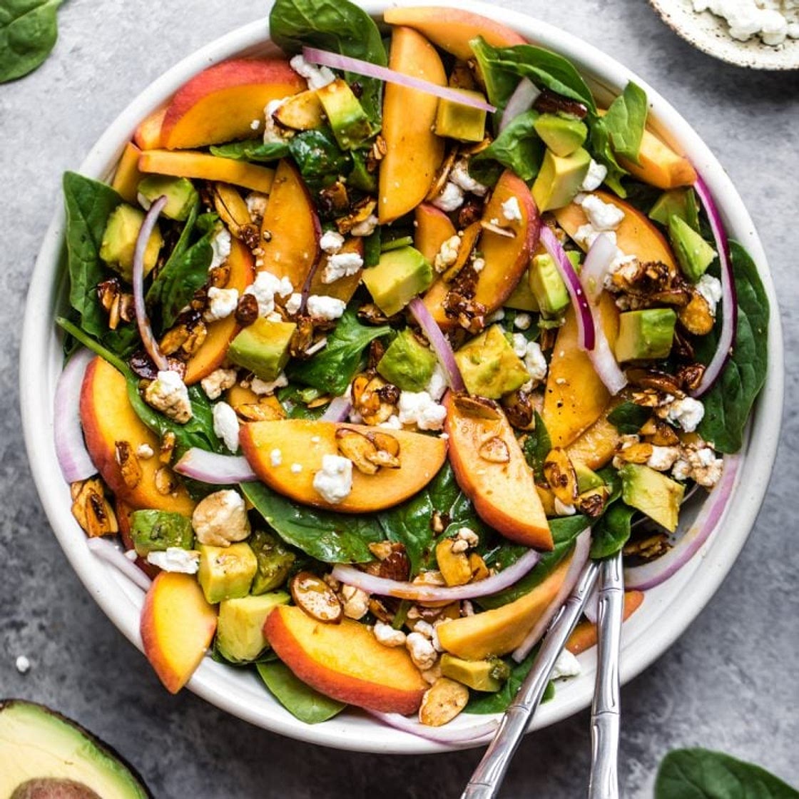 Summer Peach Spinach Salad with Avocado, Toasted Almonds + Goat Cheese