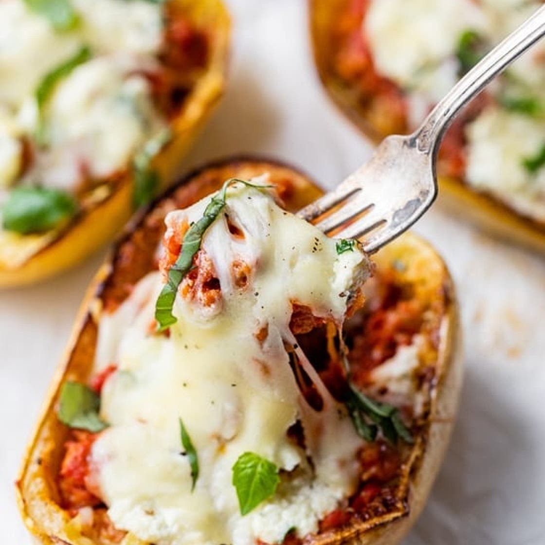 Spaghetti Squash Sausage Lasagna Boats