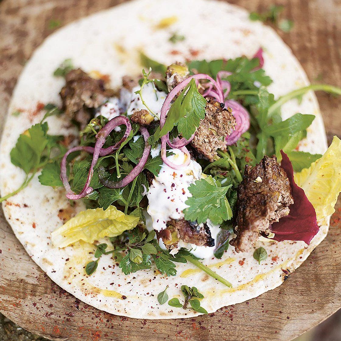 Grilled lamb kofta kebabs with pistachios & spicy salad wrap