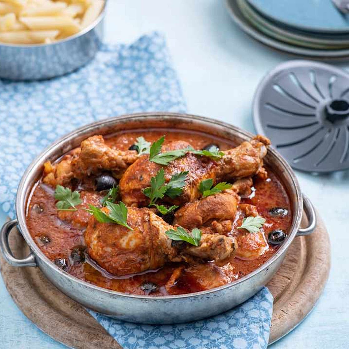 Chicken drumsticks in spicy puttanesca sauce