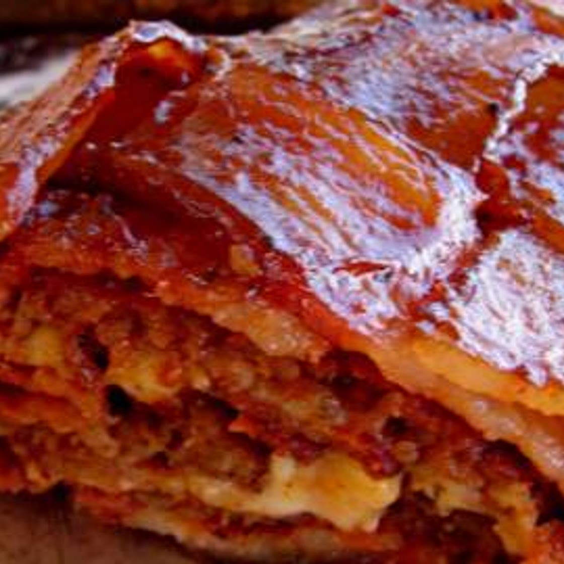 Bacon Wrapped Stuffed Sausage Fatty - Bacon Explosion