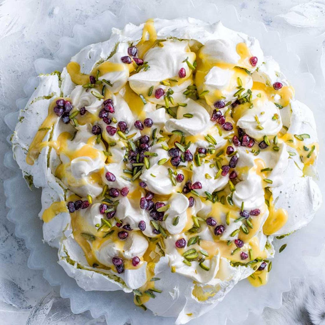 Saffron & pistachio pavlova with citrus curd