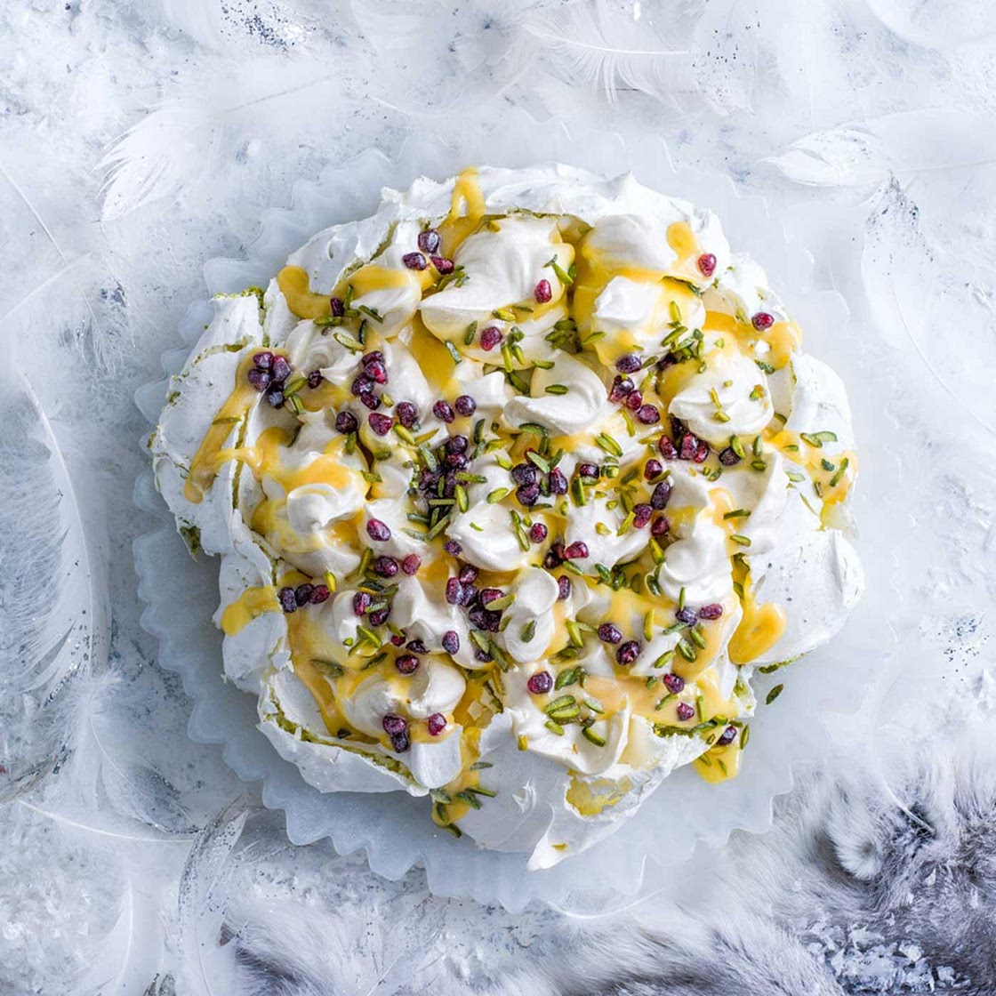 Saffron & pistachio pavlova with citrus curd