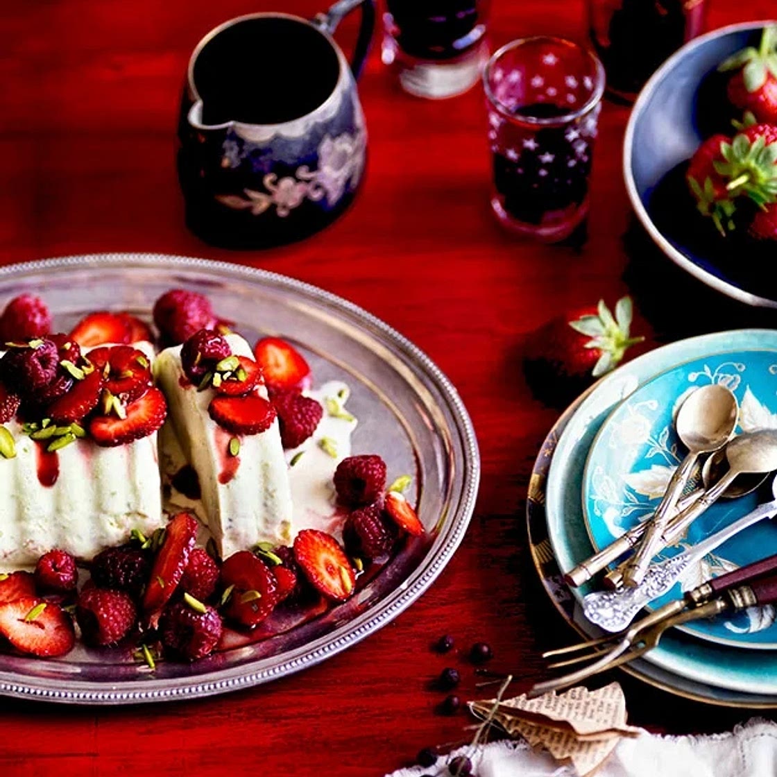 Pistachio ice-cream cake with red summer berries