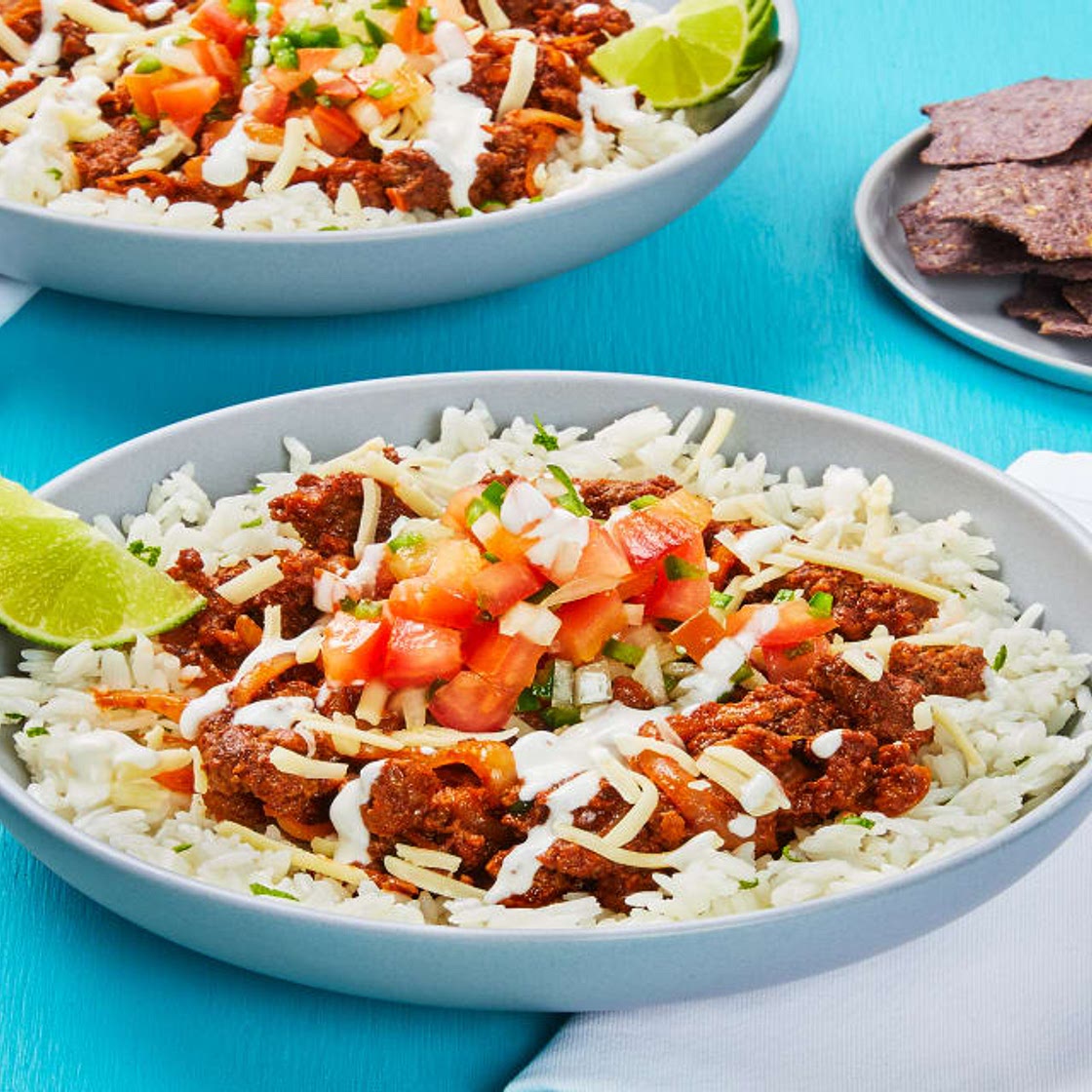 San Antonio Beef Bowls with Blue Corn Tortilla Chips, Fresh Salsa & Lime Crema