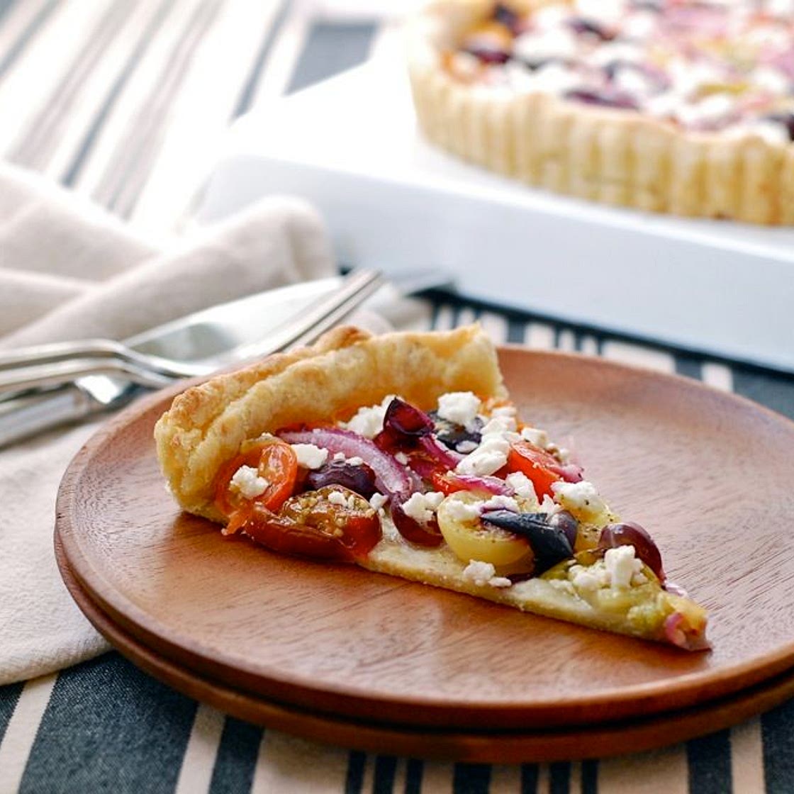 Tomato and Concord Grape Tart with a Cornmeal Black Pepper Crust