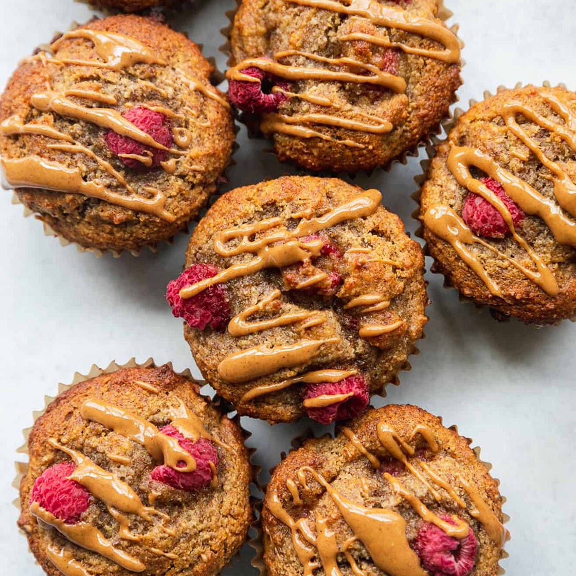 Healthy Peanut Butter + Raspberry Muffins