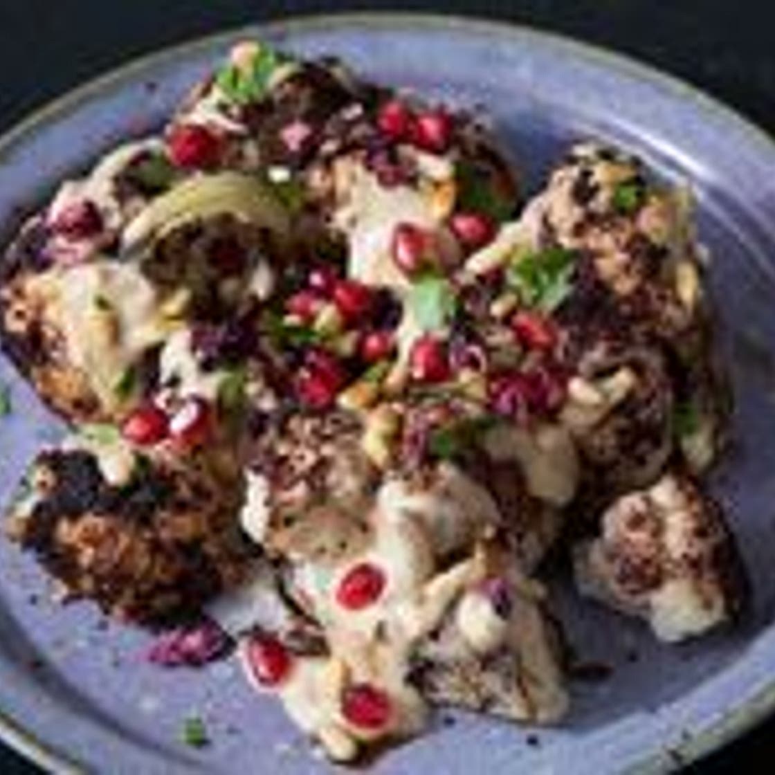 Cauliflower Shawarma with Pomegranate, Tahini, and Pine Nuts