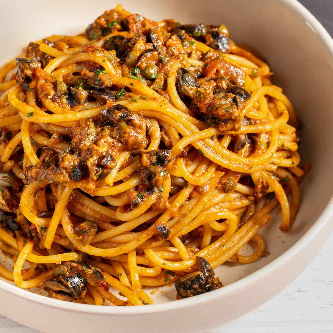 Spaghetti Puttanesca (Spaghetti With Capers, Olives, and Anchovies)