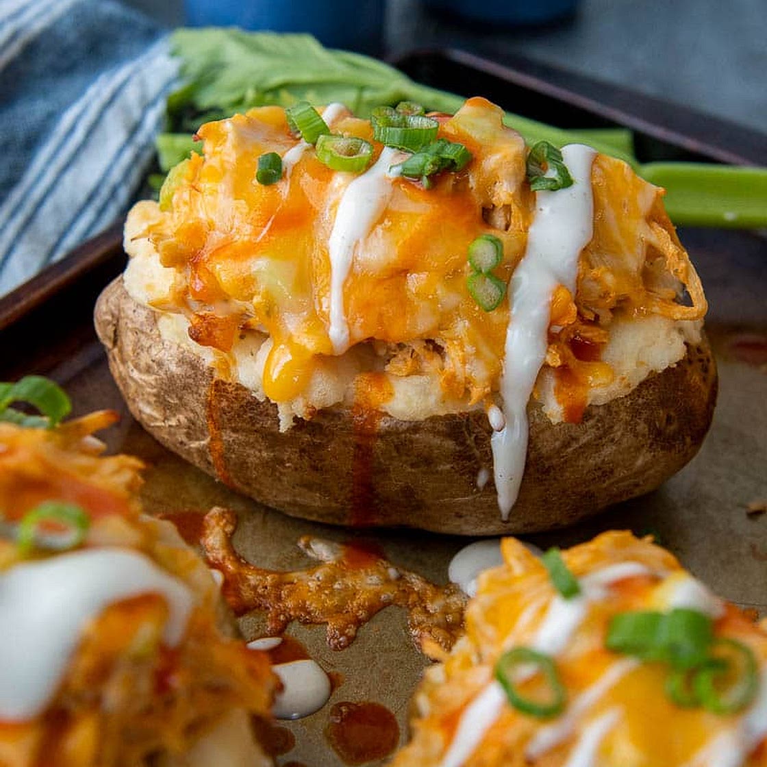 Cheesy Buffalo Chicken Baked Potatoes