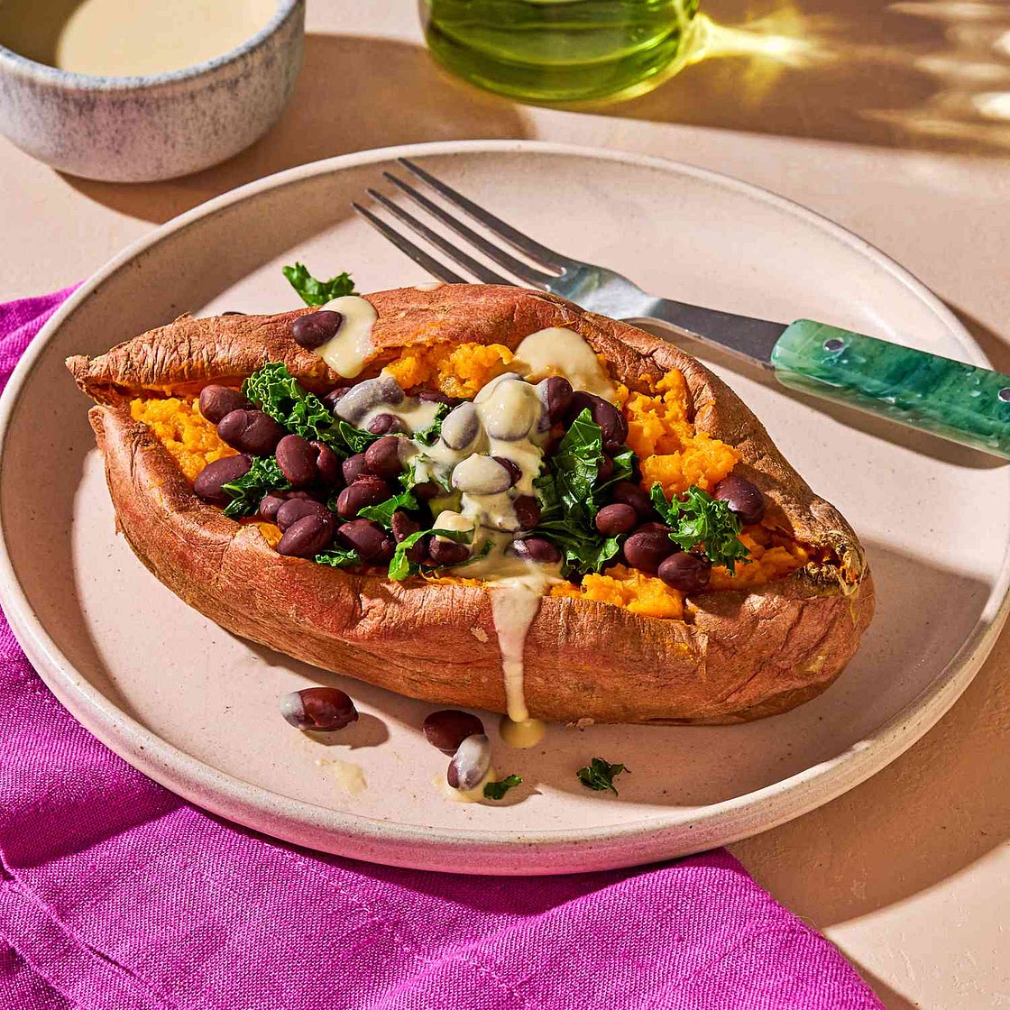 Stuffed Sweet Potato with Hummus Dressing