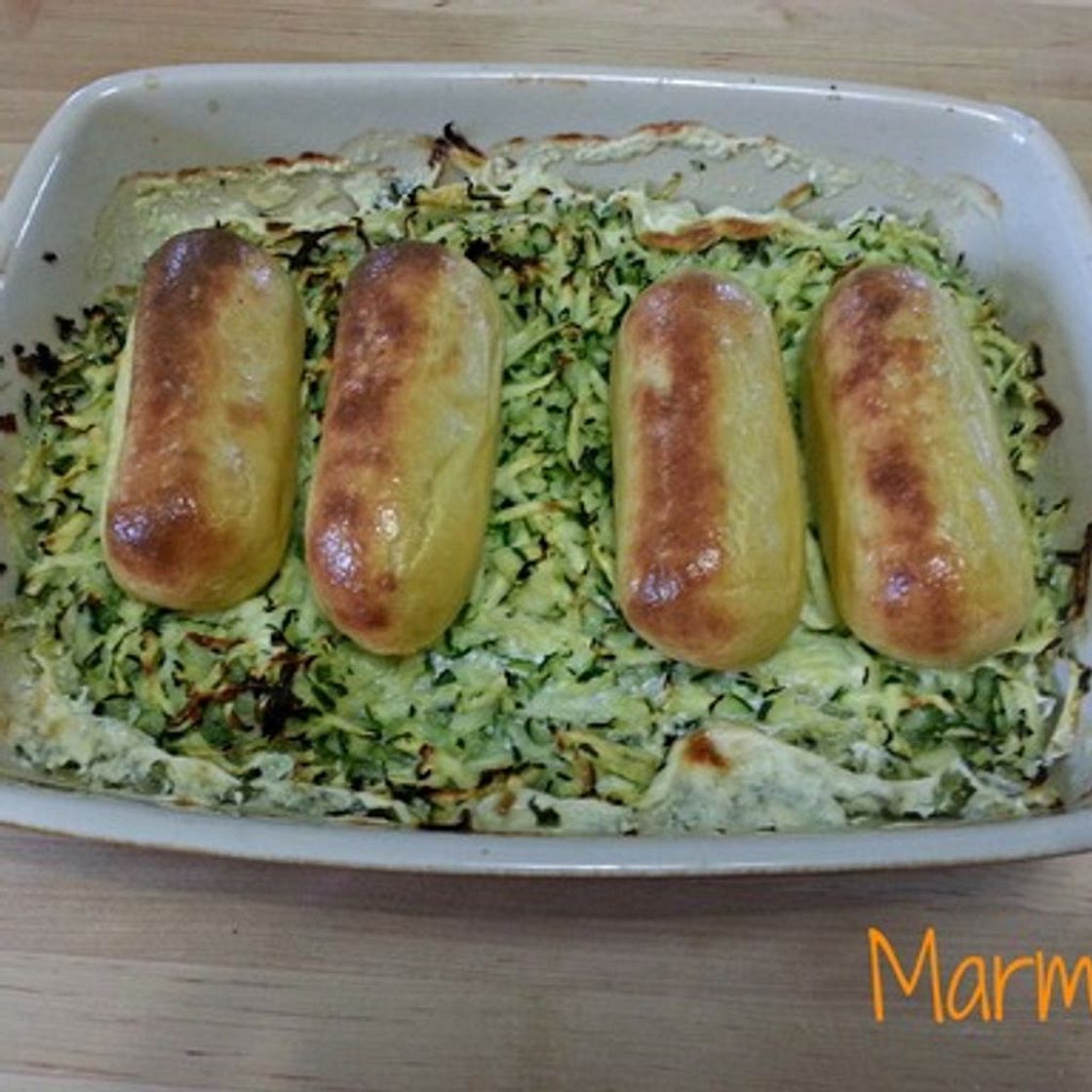 Quenelles sur lit de courgettes