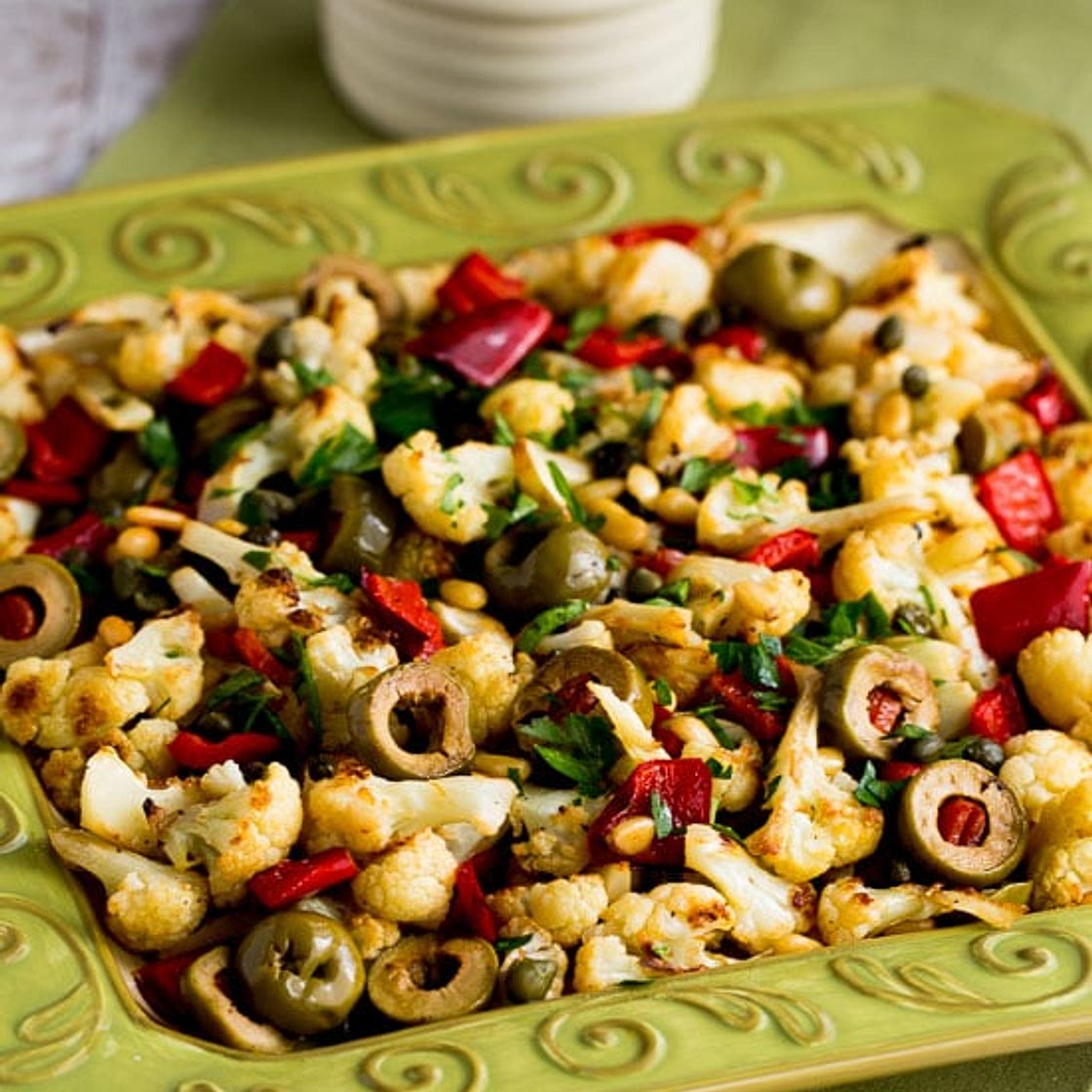 Roasted Cauliflower with Red Peppers, Green Olives, and Pine Nuts