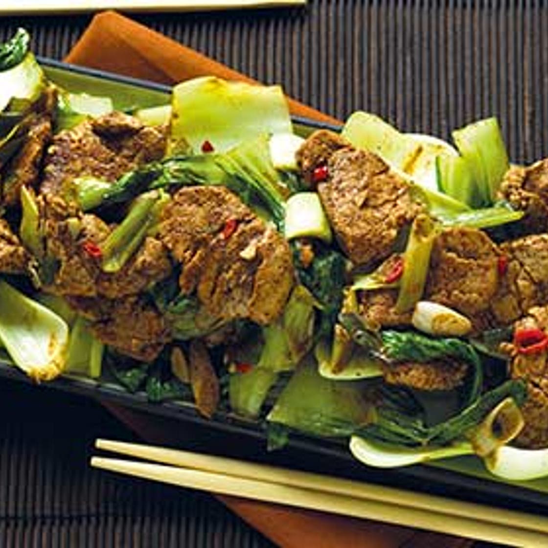 Spicy ginger and garlic pork with pak choi