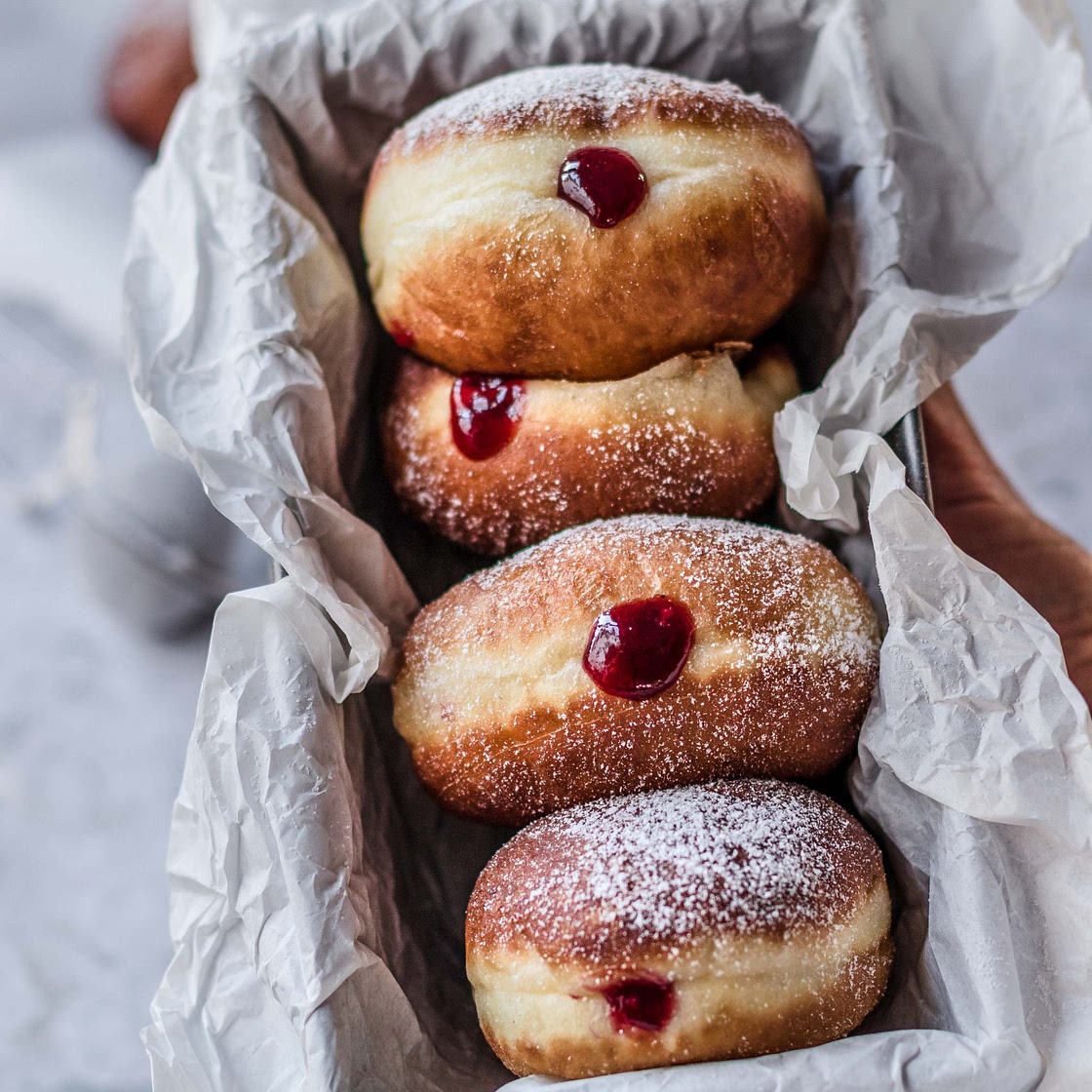 Classic jelly donuts with raspberry jam