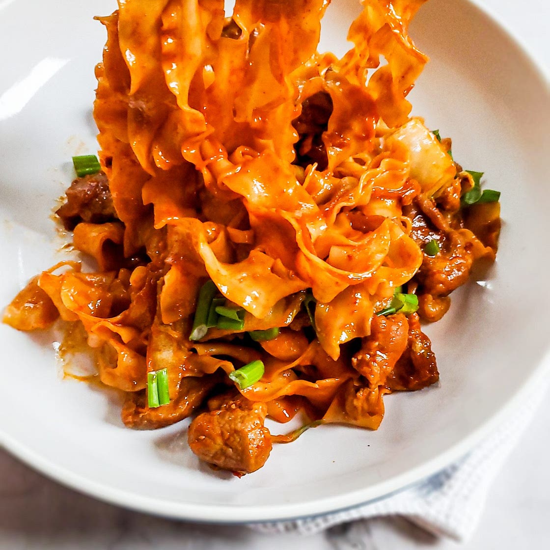 Spicy Gochujang Noodles with Pork