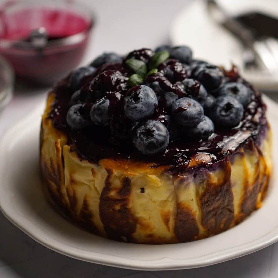 Blueberry Basque Burnt Cheesecake with Blueberry Glaze