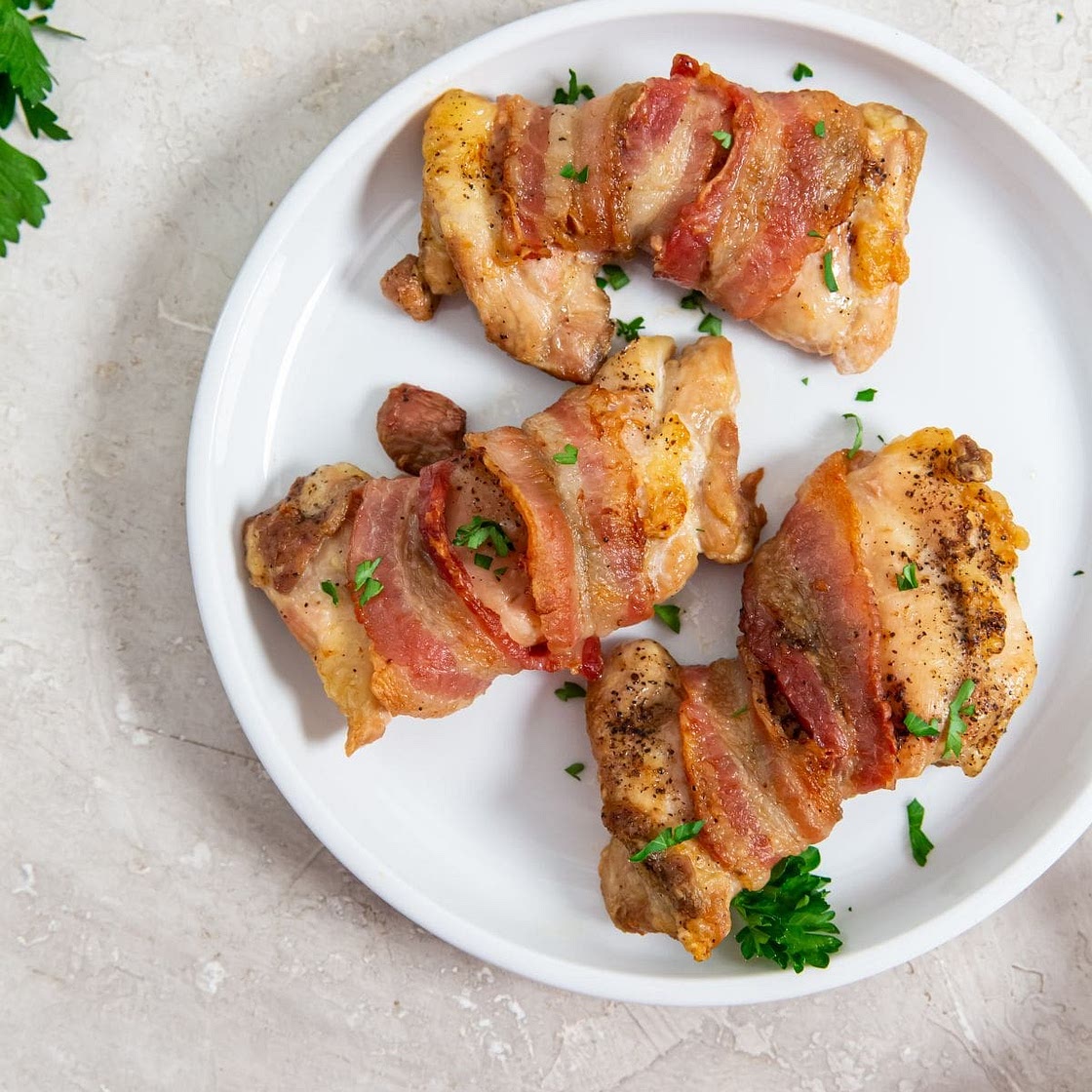 Air Fryer Bacon Wrapped Chicken Thighs