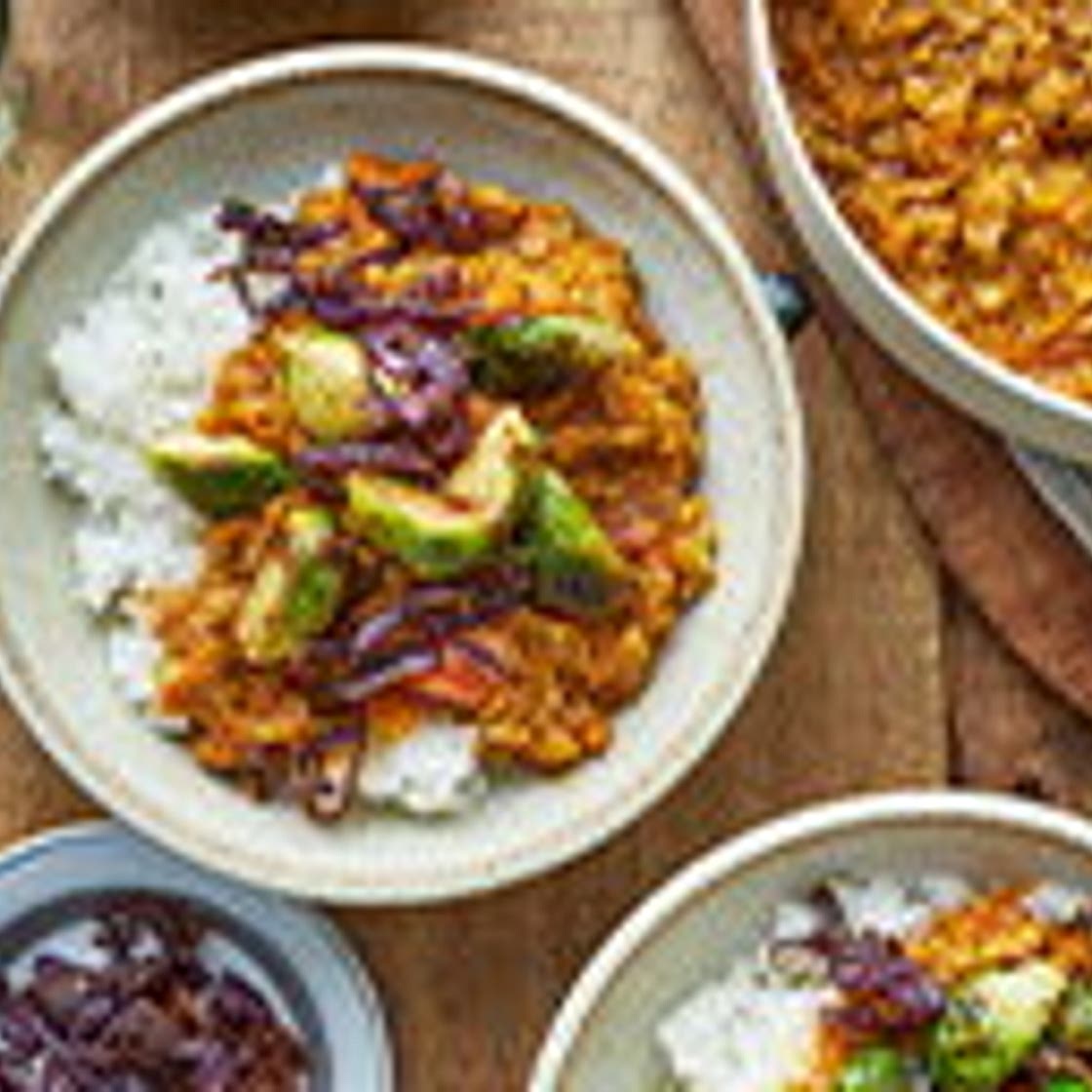 Red lentil and carrot dhal with spiced sprouts