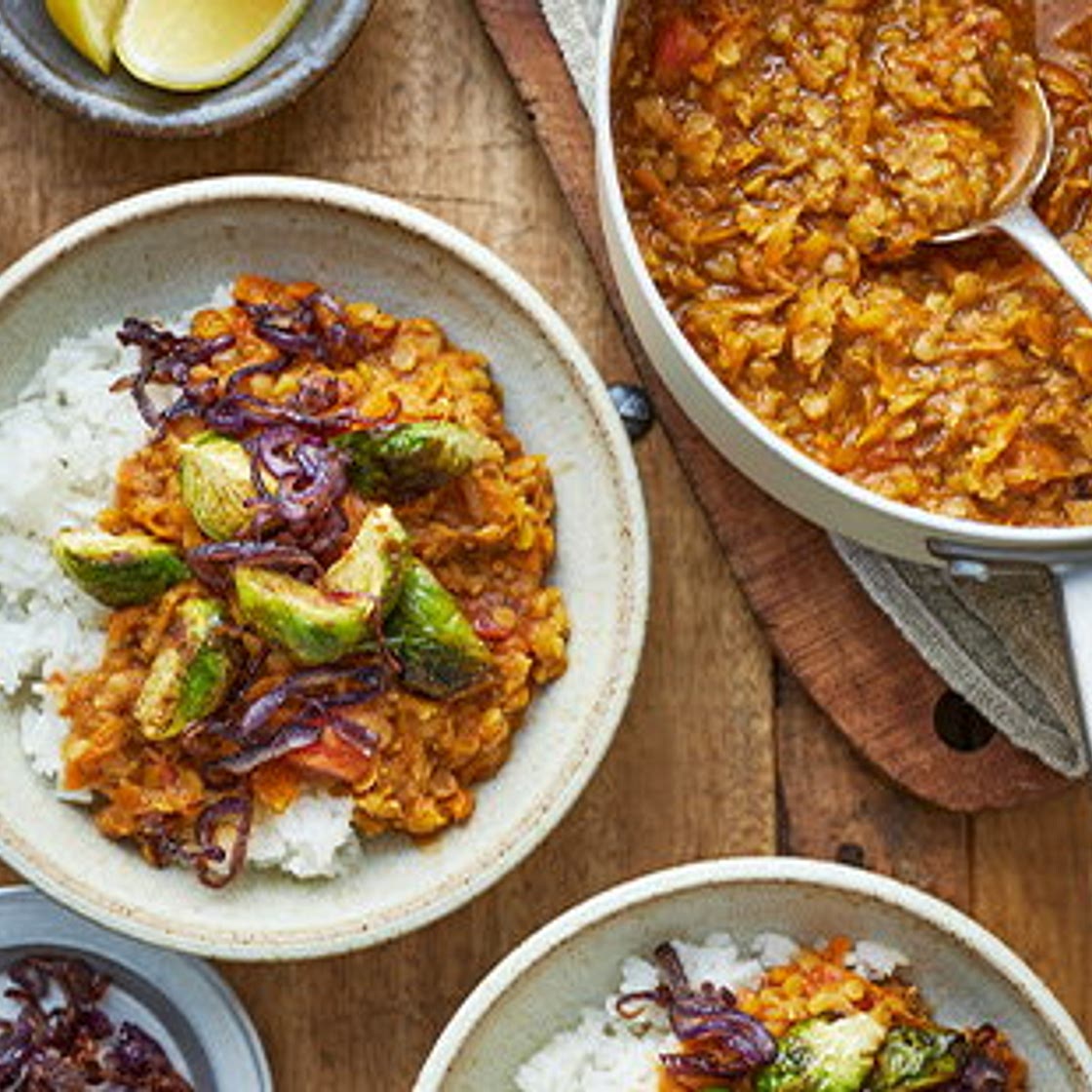 Red lentil and carrot dhal with spiced sprouts