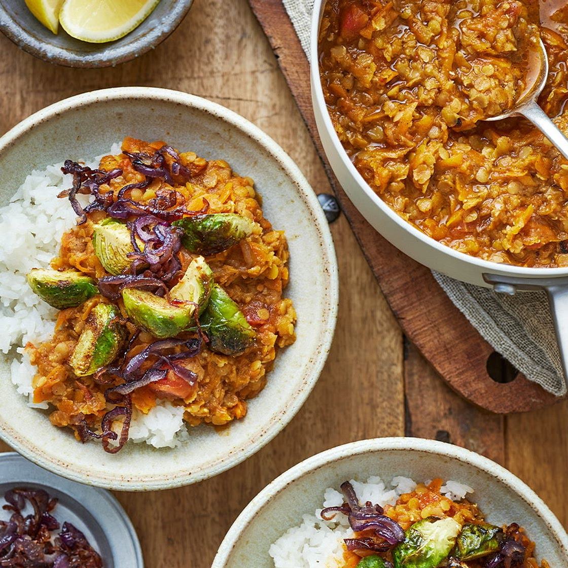 Red lentil and carrot dhal with spiced sprouts