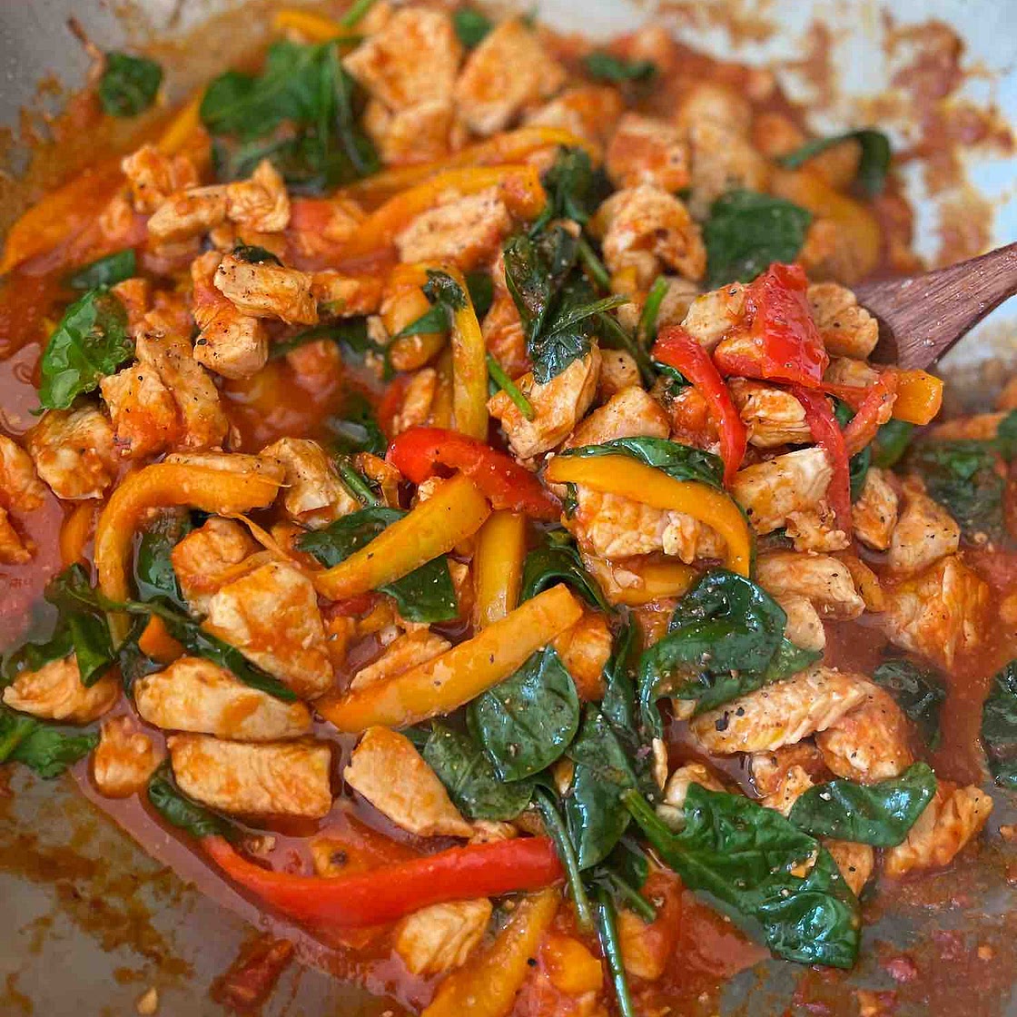 Tomato Chicken with spinach and bell peppers