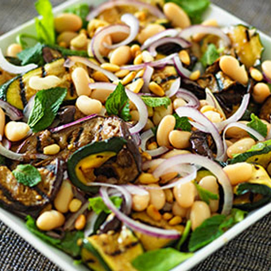 Minted aubergine with spinach and pine nuts