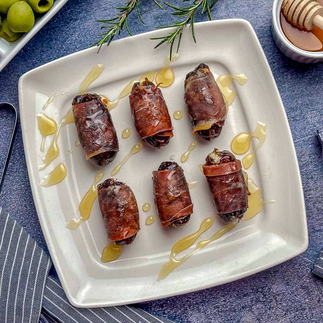Prosciutto-Wrapped Dates with Blue Cheese and Honey
