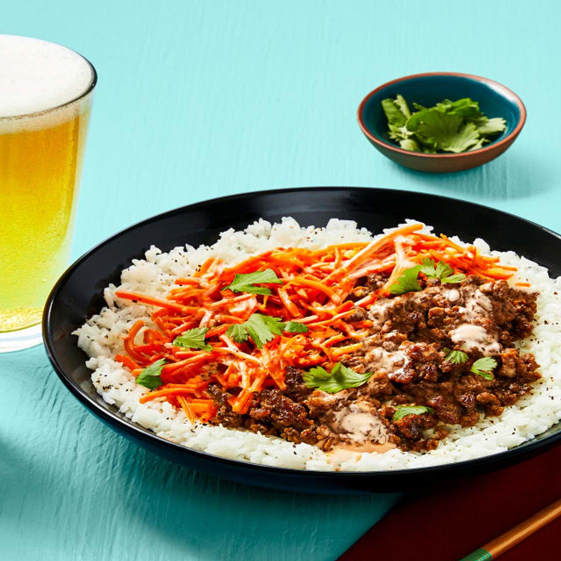 Sesame-Soy Beef Bowls with Sriracha Mayo, Cilantro & Crispy Onions