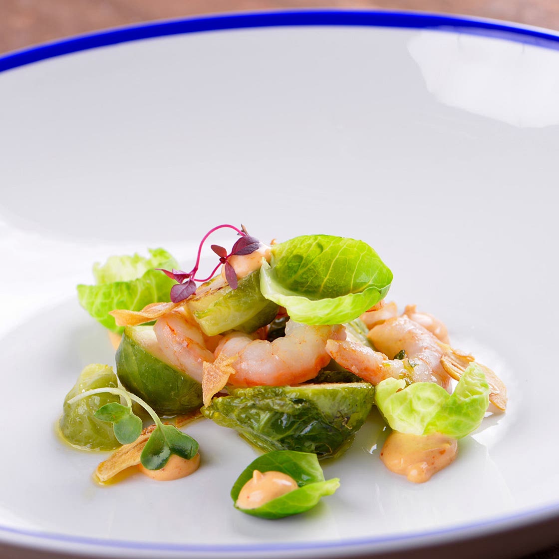 Coles de Bruselas con gambas