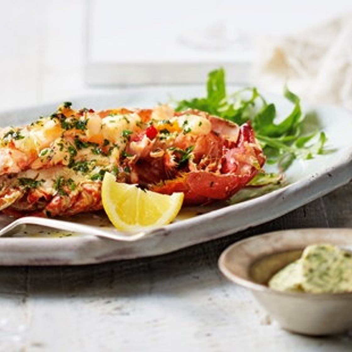 Grilled lobster with garlic and herb butter