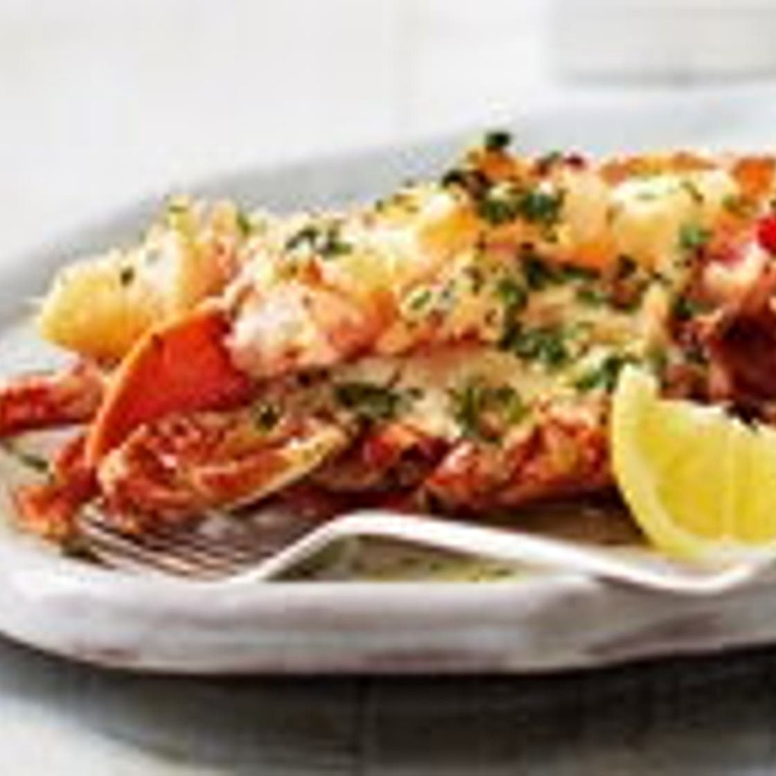 Grilled lobster with garlic and herb butter