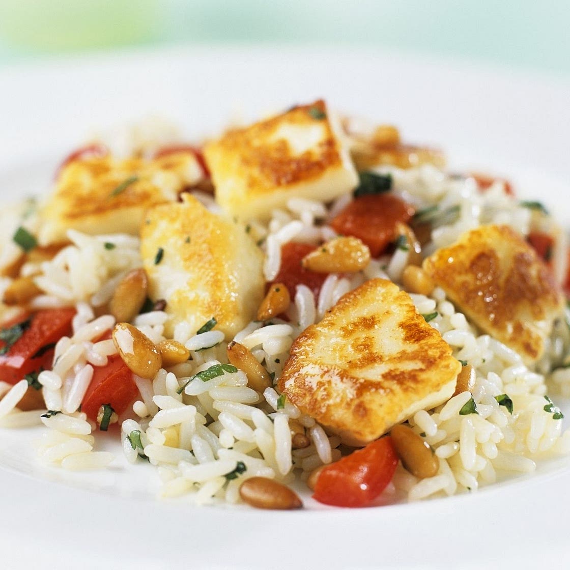 Hähnchen auf Reis mit Tomaten