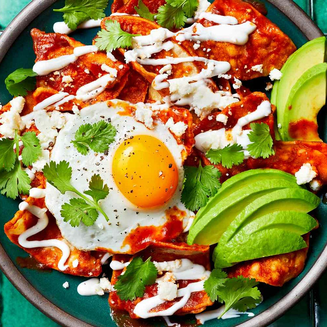 Chilaquiles Rojos with Fried Eggs and Cotija