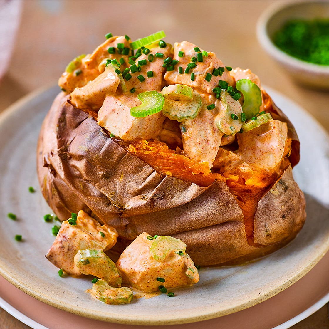 Buffalo-style chicken sweet potatoes
