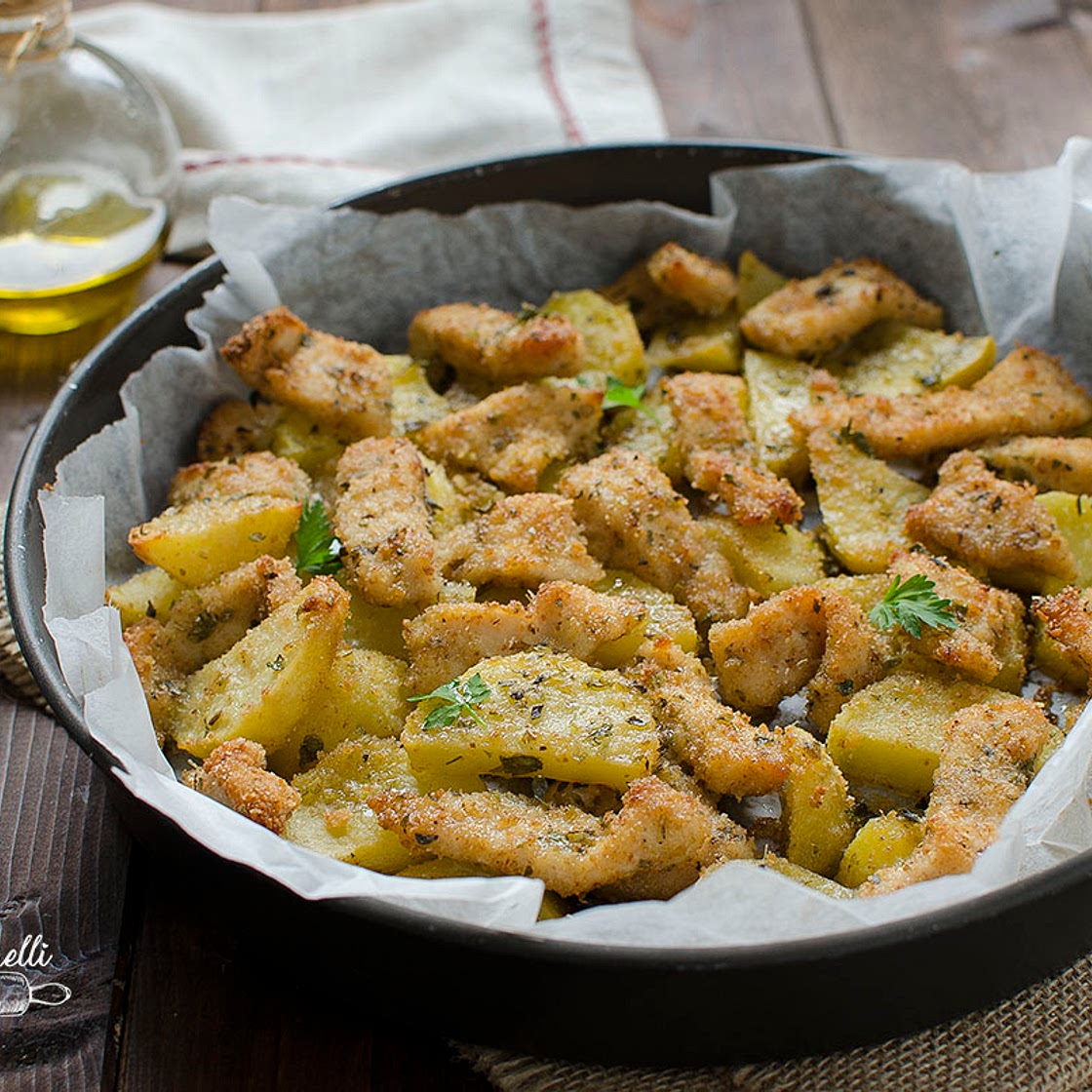 STRACCETTI DI POLLO E PATATE al forno