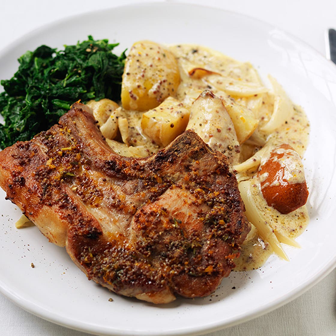 Pork chops with roasted pear, apple and new potatoes