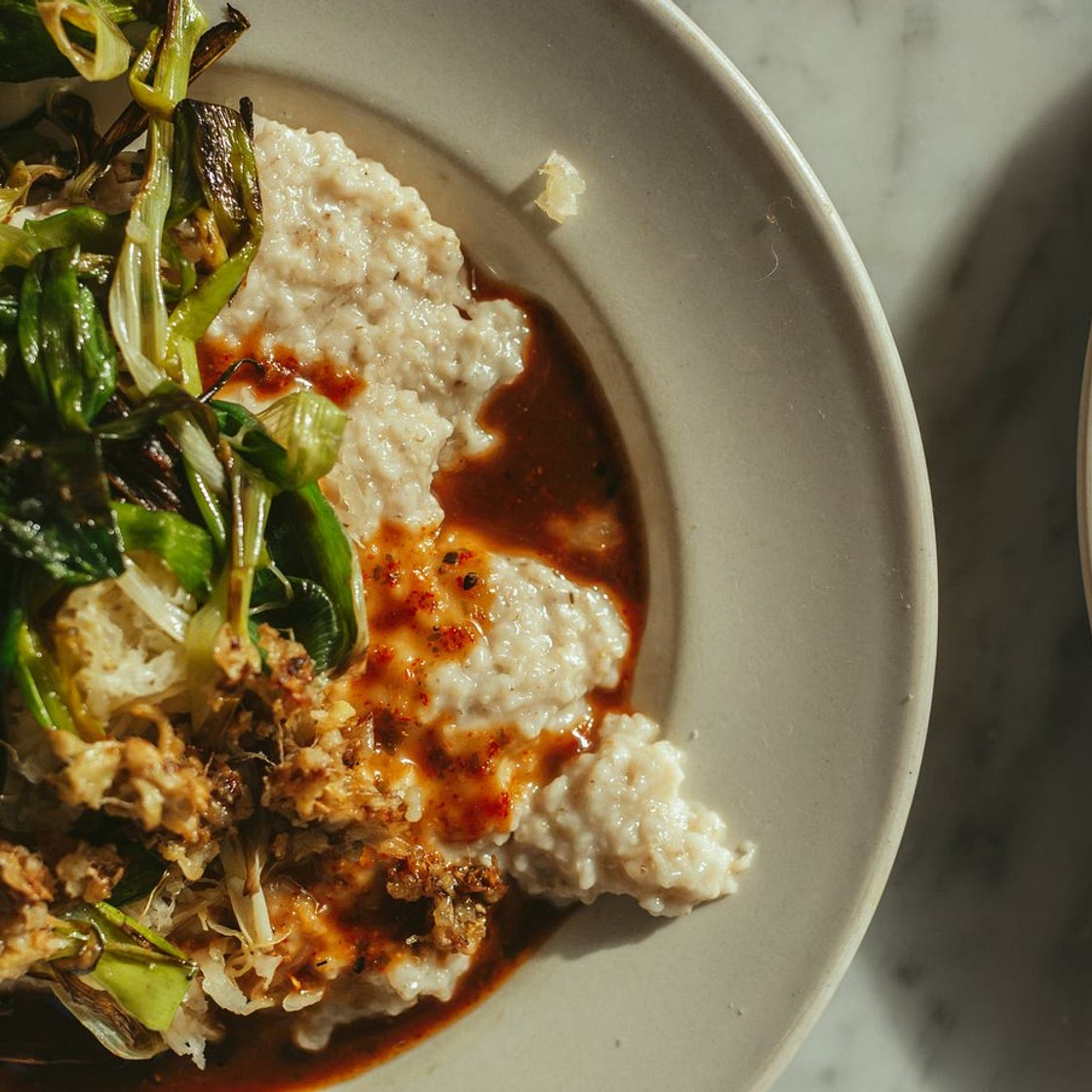 Vegan savoury oatmeal breakfast with mixed spices