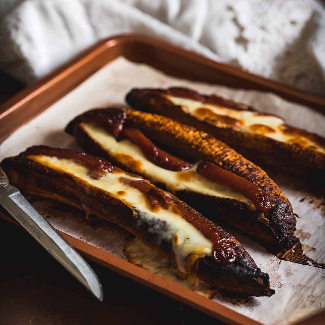 Baked Plantains with Guava and Cheese (Plátanos Asados con Bocadillo y Queso)