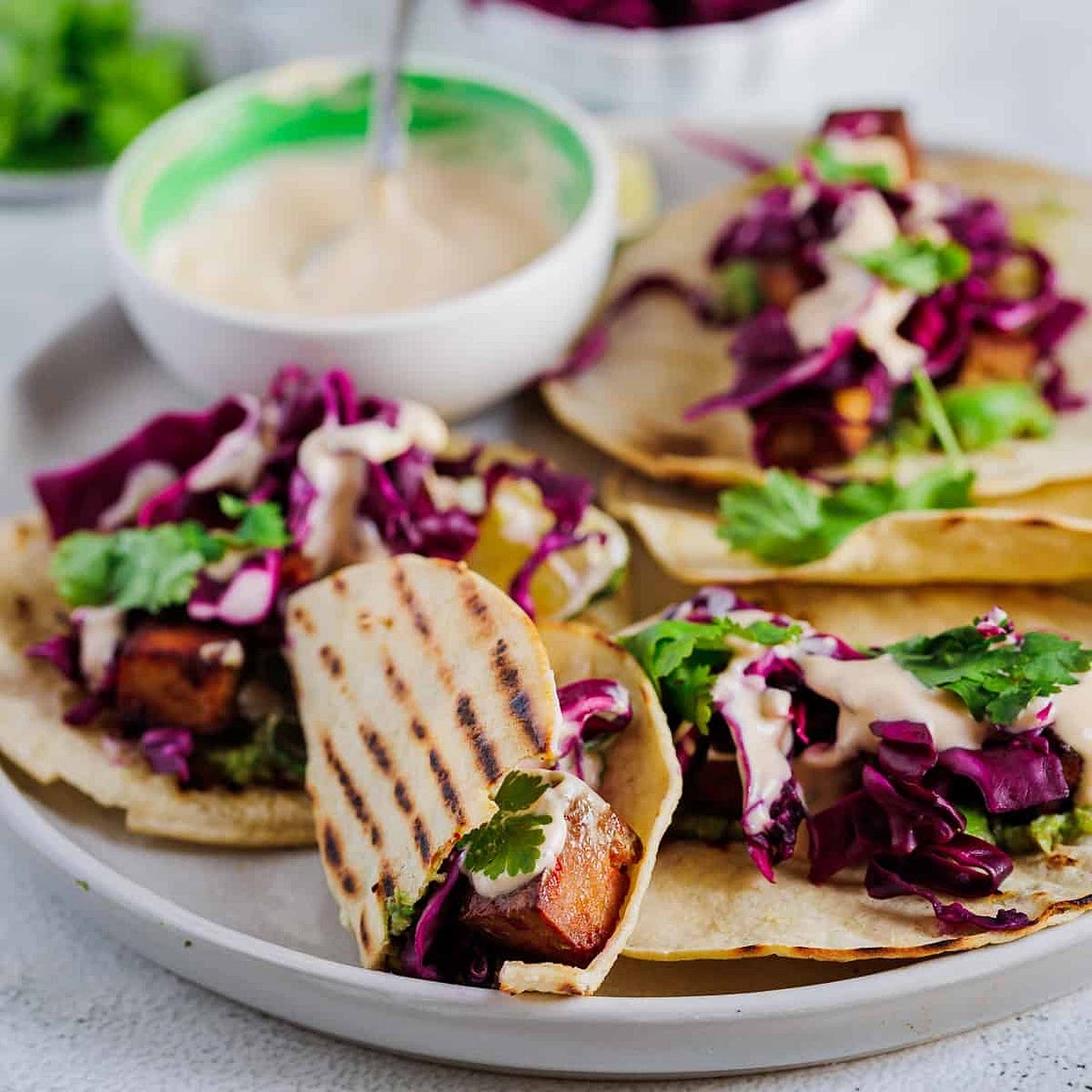 Easy tofu tacos recipe with cabbage slaw and avocado
